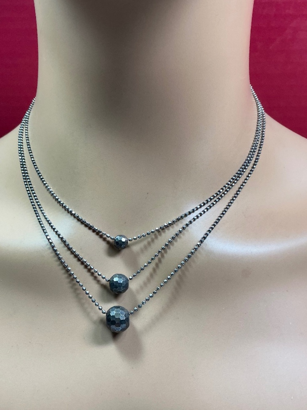 Sterling Silver Beaded Triple Strand Necklace with Hammered Spheres. 18 to 20”